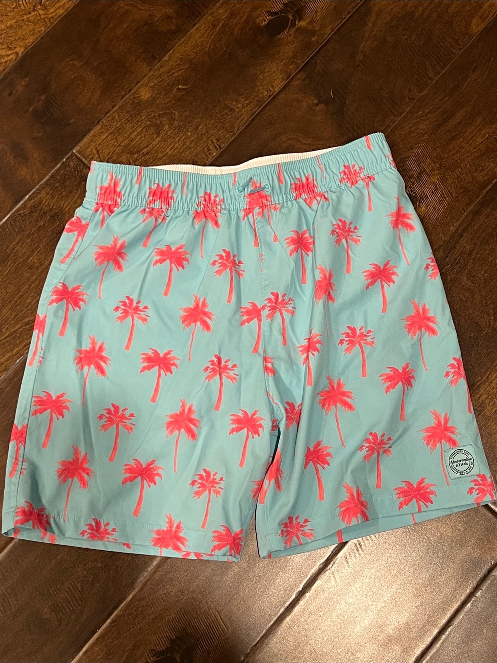 EUC Pair of abercrombie kids Palm Tree Swim Trunks Size 13/14